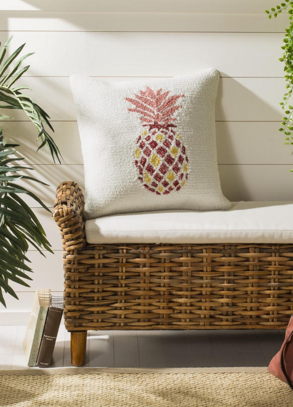 Woven bench with pineapple pillow