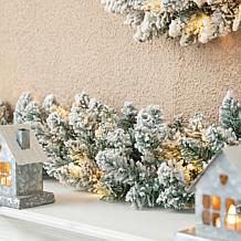 Glitzhome 2pk 6' Flocked Christmas Garland with Warm White LED Lights