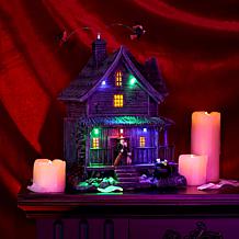 Haunted Hill Farm 1-Ft. Animated LED Haunted House with Flying Witc...