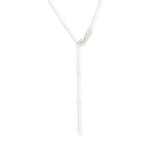 Radiance by Absolute™ Baguette and Round Cross Necklace