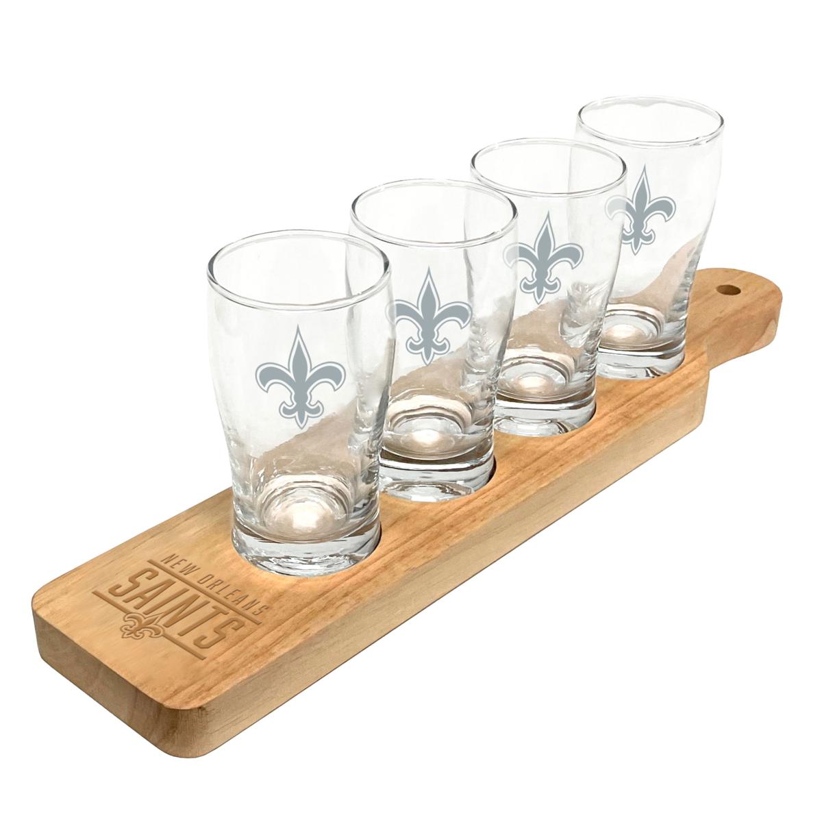 https://i02.hsncdn.com/is/image/HomeShoppingNetwork/rocs1200/new-orleans-saints-four-pack-beer-flight-glass-set-d-2023122523340135~21631414w.jpg