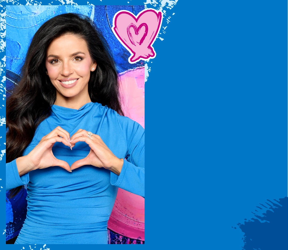 Model making a heart with her hands